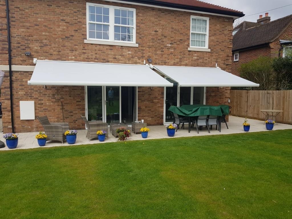 Two Awnings In White Fitted for Large Patio Space | Outershade