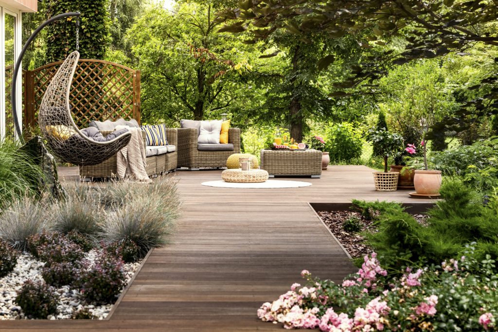 Transform your patio into a cosy retreat by adding comfortable seating options